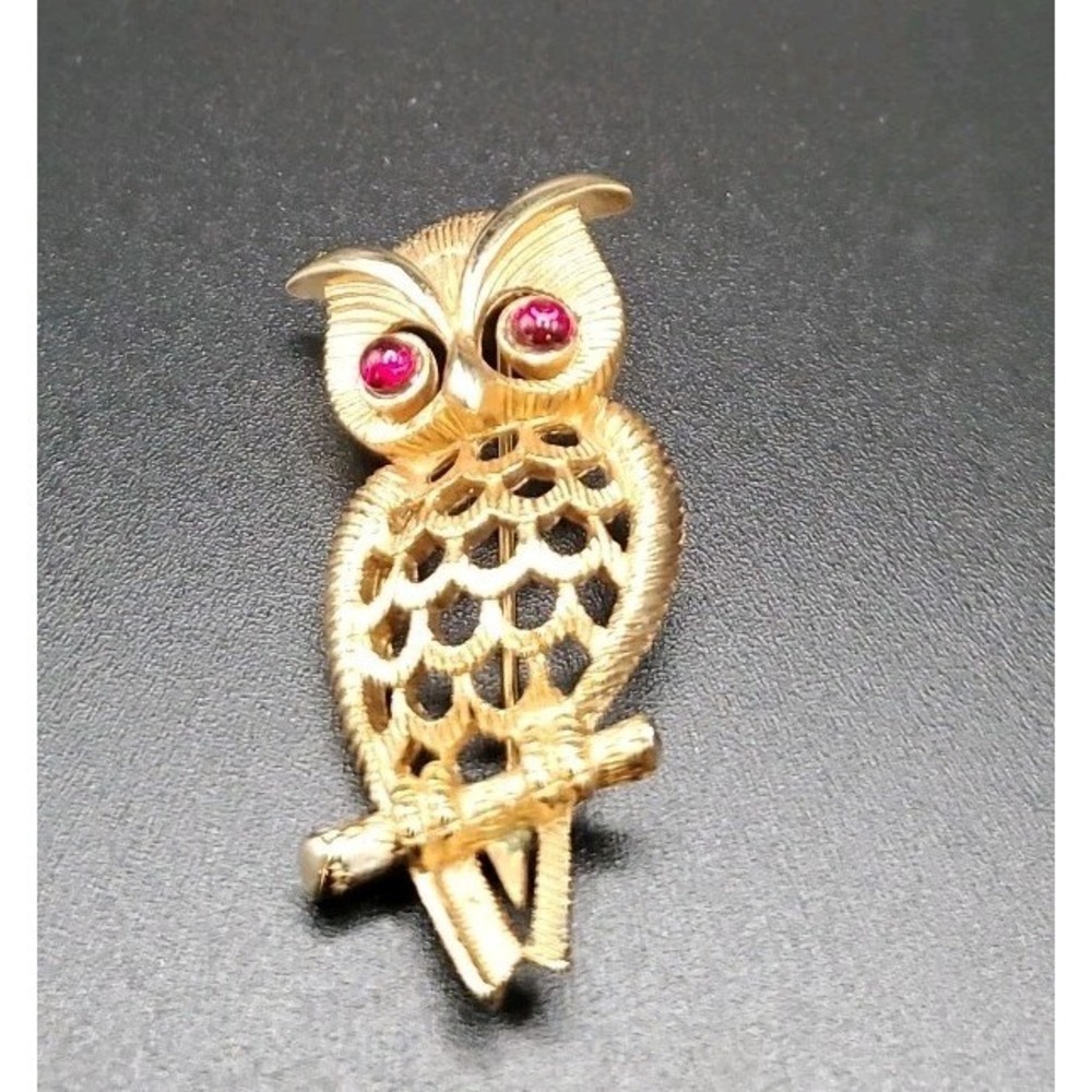 Vintage Goldtoned Avon Owl Pin/Brooch With Red Rhinestone Eyes. 2" X 1"